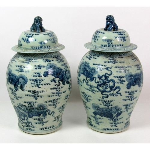 123 - A pair of 18th Century style blue and white Chinese large bulbous Pots and Covers, each decorated wi... 