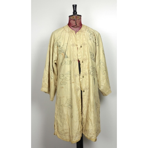 126 - A good quality 19th Century lemon silk Chinese Dragon Gown, with finely embroidered decoration and w... 