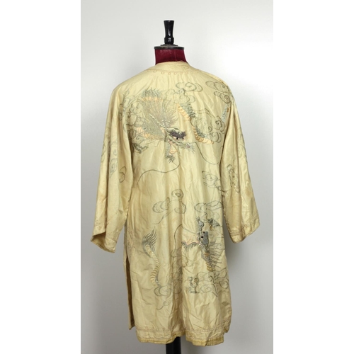 126 - A good quality 19th Century lemon silk Chinese Dragon Gown, with finely embroidered decoration and w... 