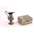 A small embossed George III silver Cream Jug, London c. 1777; and a Birmingham silver Cigarette Box,... 