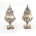 A very unusual and important pair of large early George III English silver Sugar Castors, London c. ... 