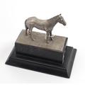 A small silver Equestrian Trophy, Dublin c. 1954, modelled as a horse standing on silver base, with ... 