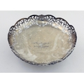 An attractive circular pierced English silver Fruit Bowl, of low proportions, Sheffield 1947, with s... 