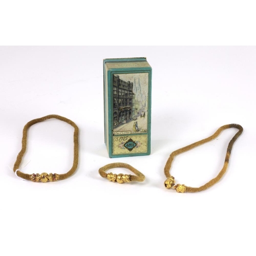 67 - Jewellery: An unusual pair of Victorian mesh Necklaces, a matching Bracelet, each with finely engrav... 