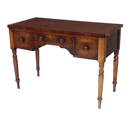 709 - A 19th Century Irish kneehole mahogany Dressing Table, the top over three frieze drawers on turned l... 