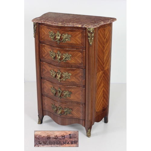 764 - A 19th Century French style kingwood and marquetry Commode, with marble top, gilt metal mounted side... 