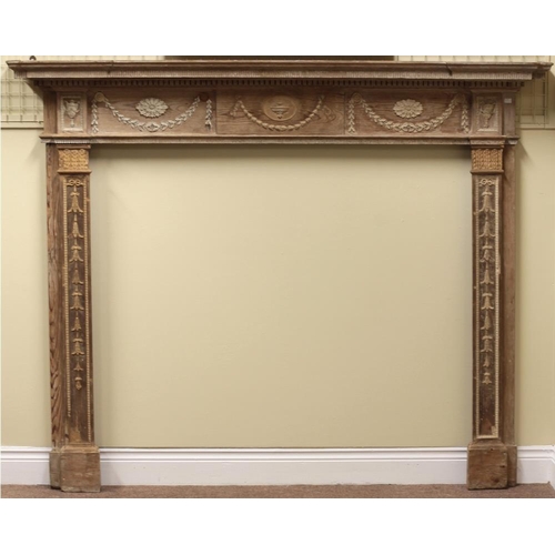 772 - An early 19th Century George III style carved pine Fireplace, with inverted breakfront top the friez... 