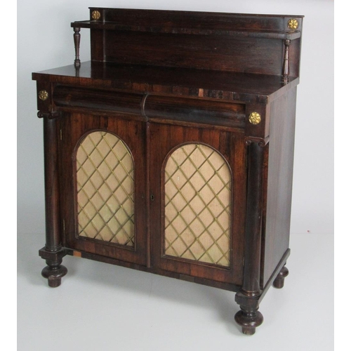 793 - A Regency period rosewood Chiffonier, the top with a single shelf on turned supports over two frieze... 