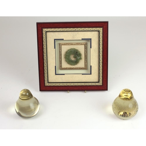 97 - A pair of glass Paperweights modelled as Pears; together with a carved green jade 