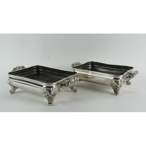 10 - A good heavy pair of early 19th Century silver plated  Dish Stands, with scroll feet. (2)