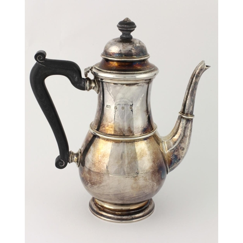 27 - A modern plain Irish silver Coffee Pot in the Queen Anne style, Dublin 1977, with blackened wooden h... 