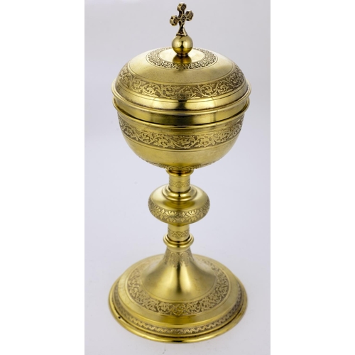 51 - A fine engraved 19th Century French silver gilt Ciborium, c. 1830, approx. 12 ozs overall, 24cms (9 ... 