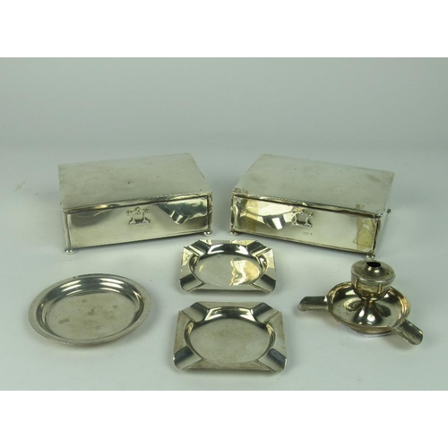 58 - An unusual matching pair of large rectangular silver Cigarette Holders, each fitted with a drawer (o... 