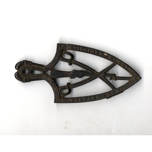 669 - Military interest: A rare and unusual metal Clothes-iron Stand, inscribed 