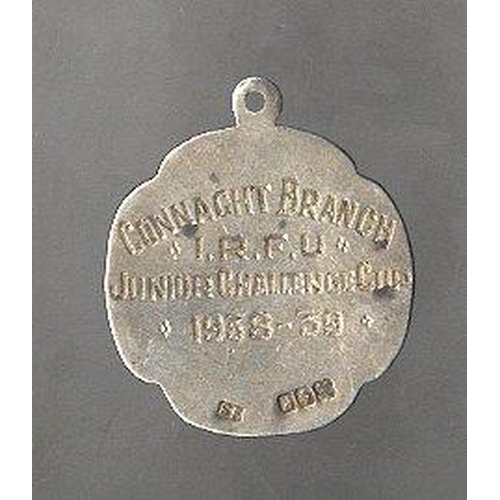 704 - Medal: Rugby: I.R.F.U., Conaught Branch, 1938 - 39, a circular silver Medal, with enamel shield shap... 