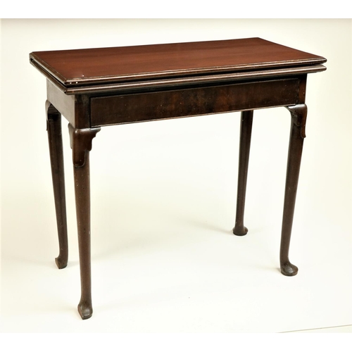 140 - An 18th Century Irish mahogany fold-over Card Table, with rectangular top and plain frieze drawer on... 