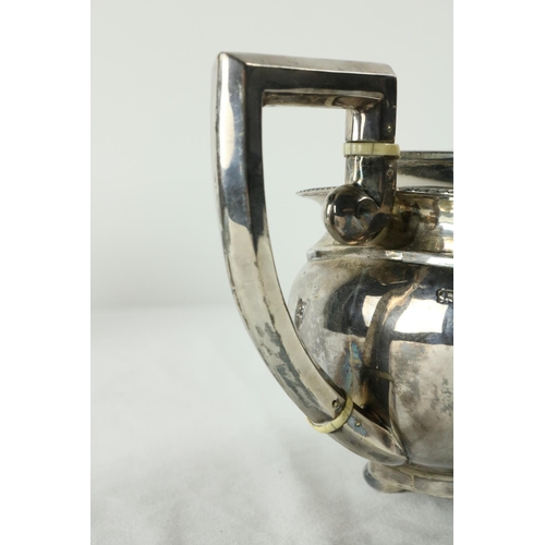 180 - A three piece silver Tea Service, Chester c. 1900, comprising ogee shaped teapot with gadroon edge o... 