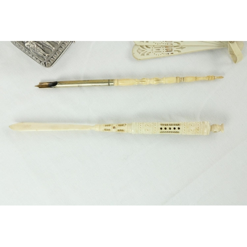 182 - A rectangular chased Indian white metal Cigarette Case, a Cantonese ivory Card Case, a Chinese carve... 