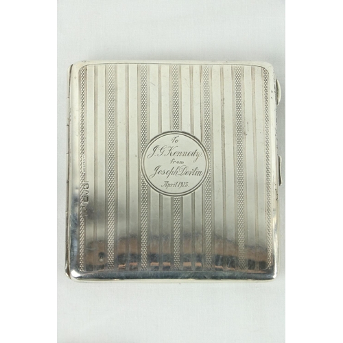 183 - A machine turned silver stamp and Sovereign Purse, Chester 1920, a silver heart shaped Vesta Case, a... 