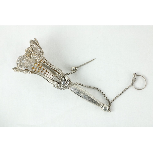 186 - A cased Victorian silver Sugar Sifter Ladle, London 1848 & a bright cut Caddy Shovel both cased ... 