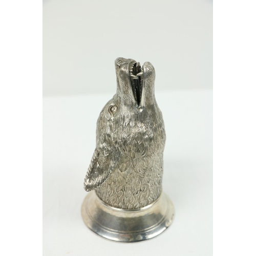 192 - A fine quality silver Stirrup Cup, modelled as a snarling wolf, approx. 266 grams, hall marked Londo... 