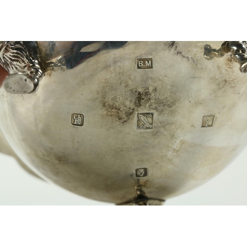 196 - An Irish silver Sugar Bowl, with 1916 - 1966 commemoration mark by B.M. Dublin, with shaped rim on t... 