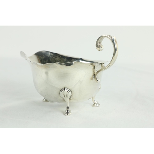 197 - An Irish George III silver helmet shaped Cream Jug, Dublin 1767, probably John Locker on stem, circu... 