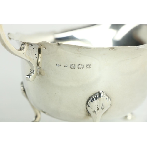 197 - An Irish George III silver helmet shaped Cream Jug, Dublin 1767, probably John Locker on stem, circu... 