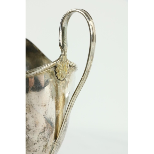 197 - An Irish George III silver helmet shaped Cream Jug, Dublin 1767, probably John Locker on stem, circu... 