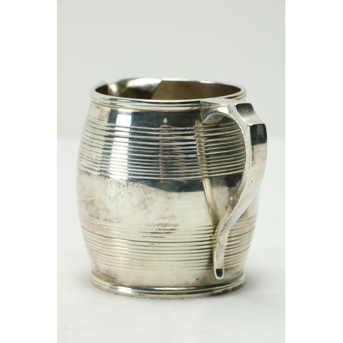 208 - A late George III Scottish silver Cream Jug, Edinburgh 1814, the barrel shaped body with a shaped ha... 