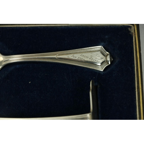 209 - A Victorian silver Set, knife, fork, spoon and napkin, London c. 1858, in original case with label o... 