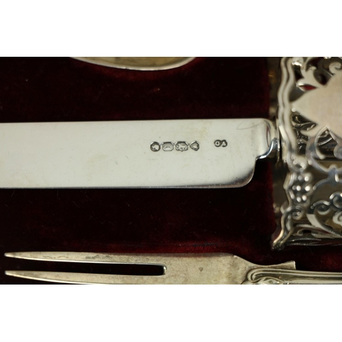 209 - A Victorian silver Set, knife, fork, spoon and napkin, London c. 1858, in original case with label o... 