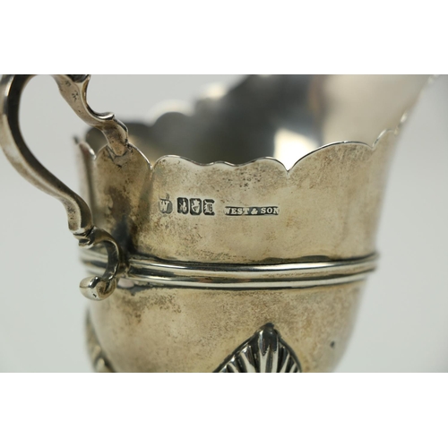 209 - A Victorian silver Set, knife, fork, spoon and napkin, London c. 1858, in original case with label o... 