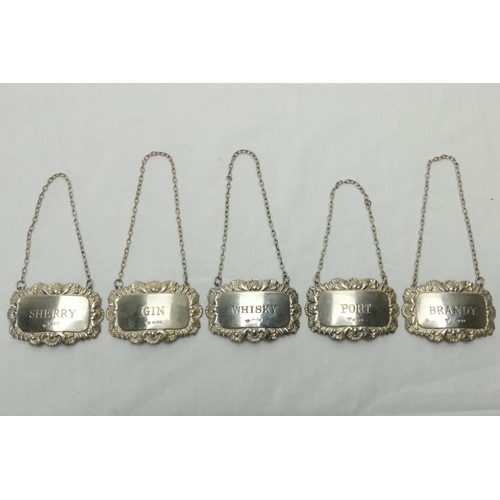 210 - A good set of 5 silver Decanter Labels, for Whiskey, Brandy, Port, Gin & Sherry, London 1977, ea... 