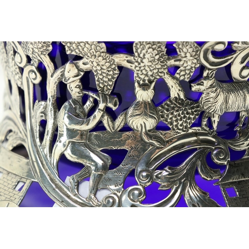 219 - A good Irish silver Dish Ring, by West & Son, Dublin 1916, chased and pierced, and with etched d... 