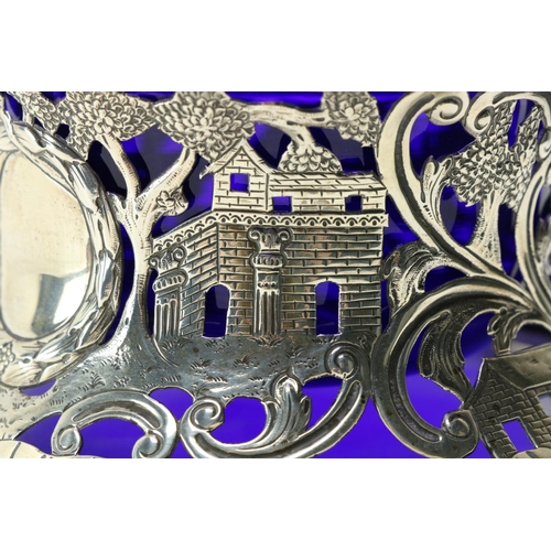 219 - A good Irish silver Dish Ring, by West & Son, Dublin 1916, chased and pierced, and with etched d... 