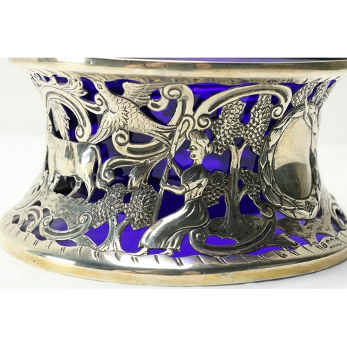 219 - A good Irish silver Dish Ring, by West & Son, Dublin 1916, chased and pierced, and with etched d... 