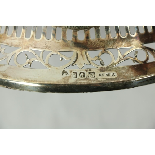 220 - An attractive early 20th Century Irish silver Dish Ring, decorated in the Adams taste with pierced d... 