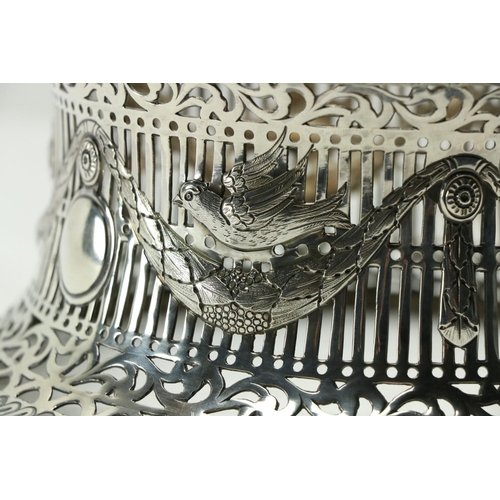 221 - An Irish pierced silver Dish Ring, Dublin 1918, decorated with different birds above leaf swags, 8