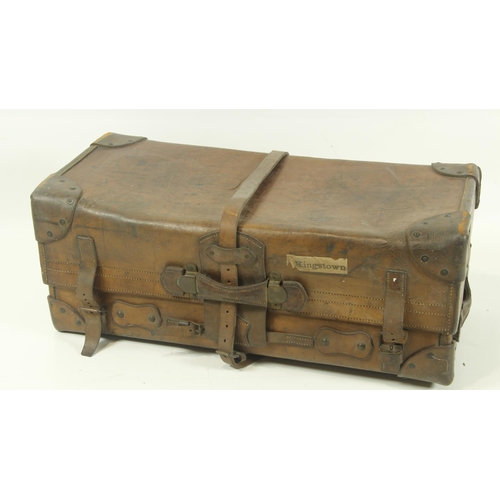38 - A very heavy late 19th Century leather Travelling Trunk, with reinforced corners and multiple straps... 