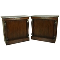 A very fine pair of Regency mahogany Side Cabinets, applied with gilt metal mounts, each with an ass... 