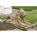 A good pair of early composition Stone Figures, each modelled as a recumbent lion on rectangular bas... 