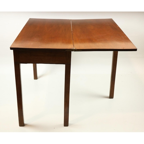 59 - A 19th Century Irish mahogany fold-over Tea Table, with frieze drawer and brass handles, on square l... 