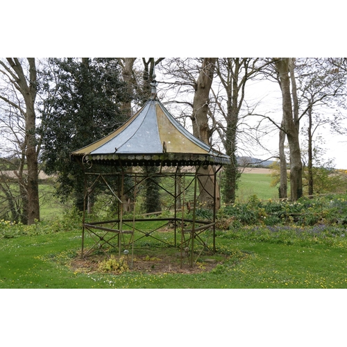 591 - THIS LOT IS WITHDRAWN...An attractive hexagonal shaped wrought iron Garden Gazebo, with galvanised d... 