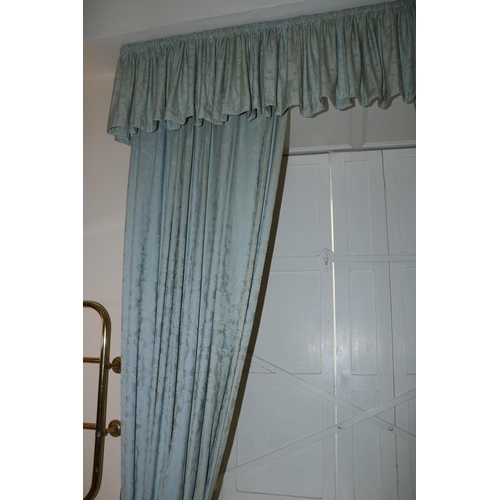 69 - Two pairs of lined salmon coloured Curtains, 274cms drop x 183cms wide (9' x 6'), with attractive dr... 