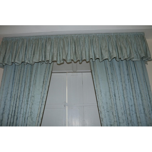 69 - Two pairs of lined salmon coloured Curtains, 274cms drop x 183cms wide (9' x 6'), with attractive dr... 