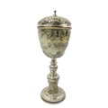 A fine quality Irish Victorian silver Standing Cup and Cover, decorated in repoussé design with flor... 