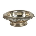 An Edwardian silver Bowl, the shaped and decorated rim designed with shell and beading, on a stepped... 