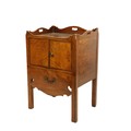 A good George III inlaid mahogany tray top Bedside Cupboard, with three-quarter gallery above two cu... 