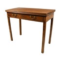 A 19th Century Irish mahogany fold-over Tea Table, with frieze drawer and brass handles, on square l... 